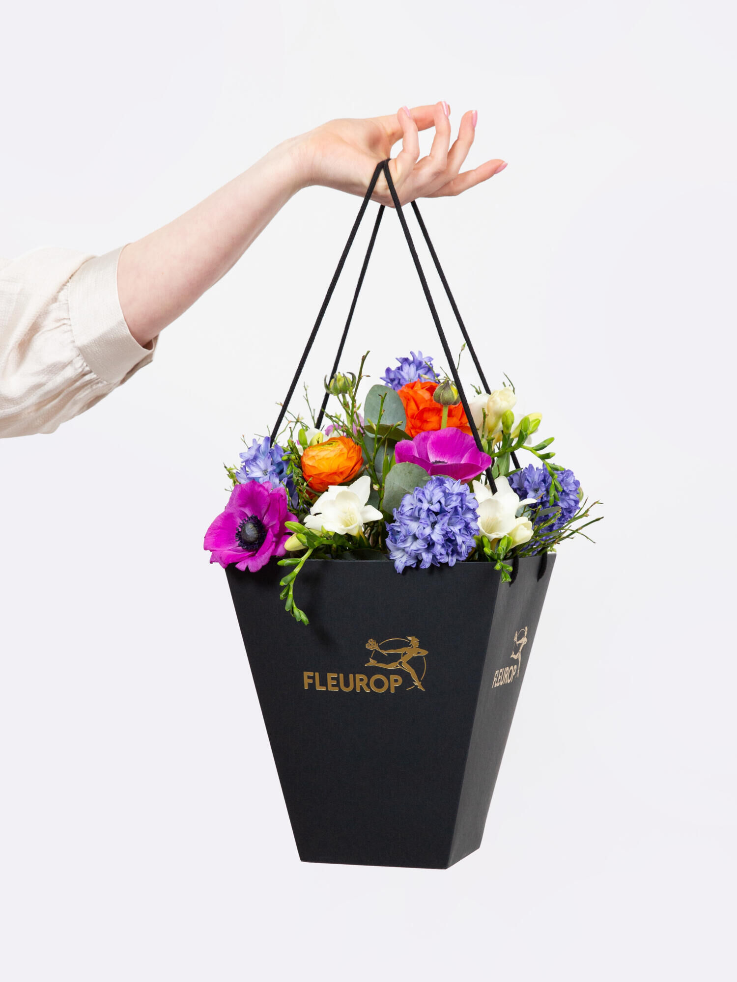 Spring Awakening - Main Colors: VARICOLORED - Main Flowers: FREESIA, HYACINTHS, RANUNCULI