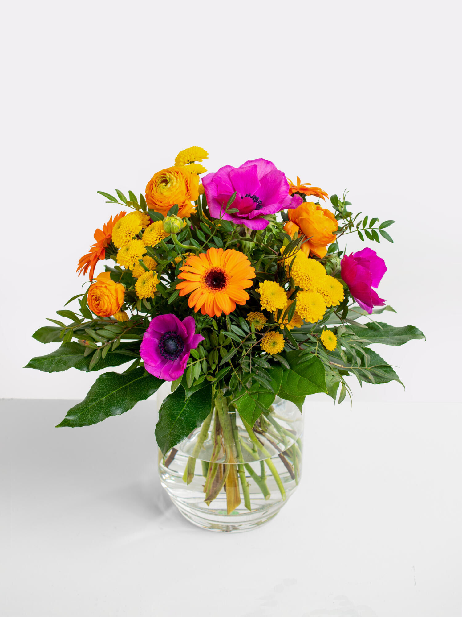 Frühlingsgarten - Hauptblüte: Chrysanthemen, Germini, Ranunkeln - Hauptfarbe: Gelb, Orange, Pink