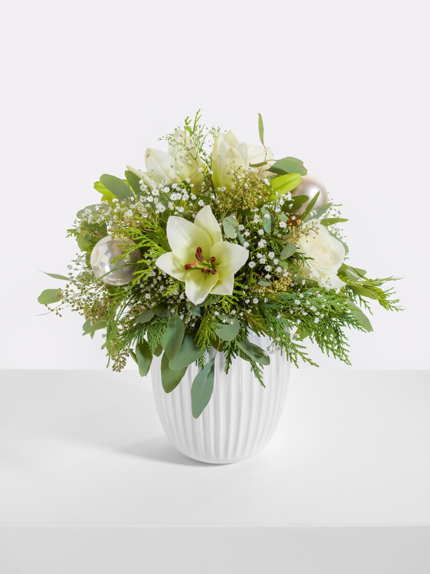 Schneezauber - Hauptblüte: Lilien, Rosen - Hauptfarbe: Weiß