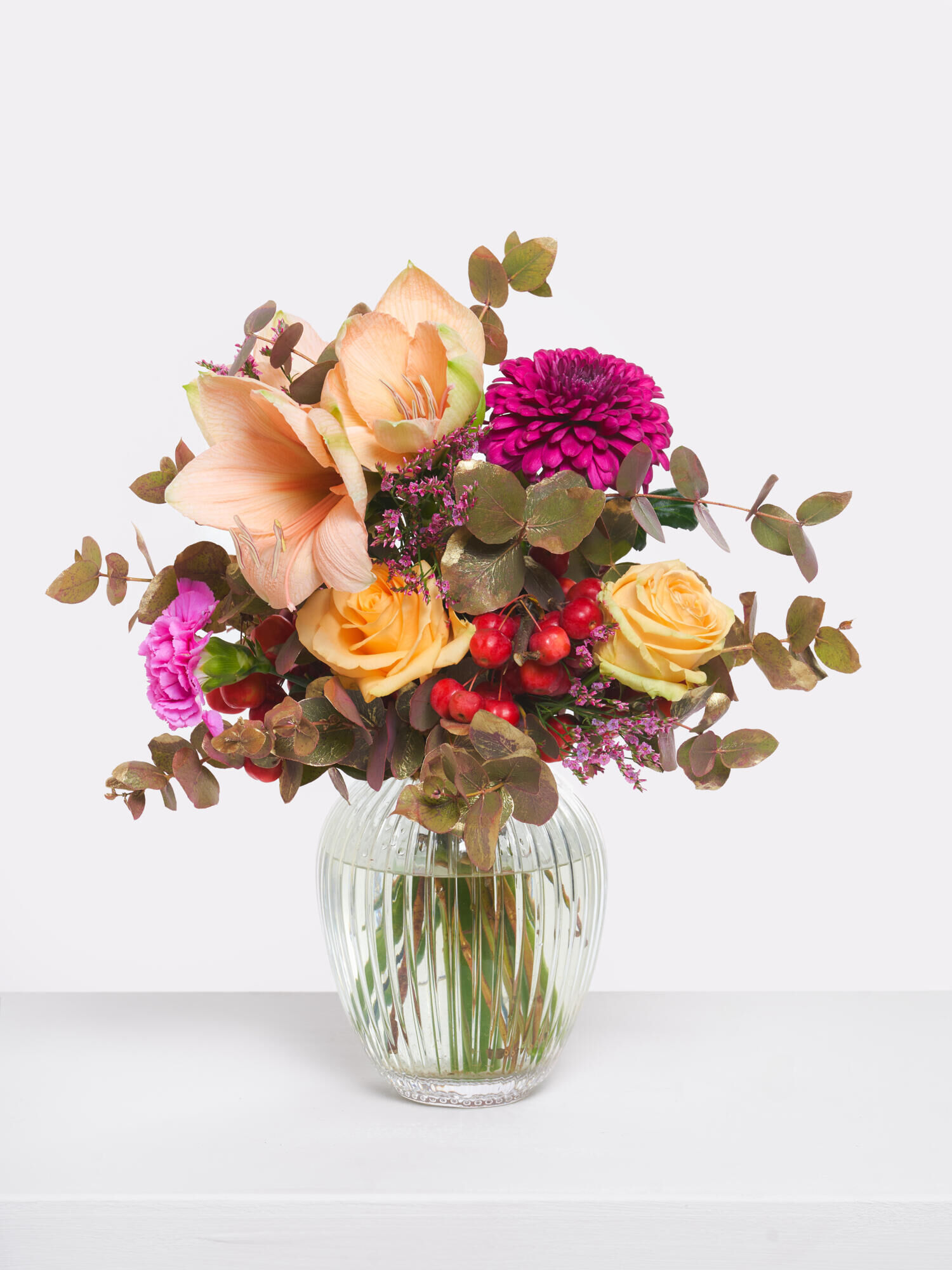 Süßes Glück - Hauptblüte: Amaryllis, Chrysanthemen, Nelken, Rosen - Hauptfarbe: Apricot, Violett