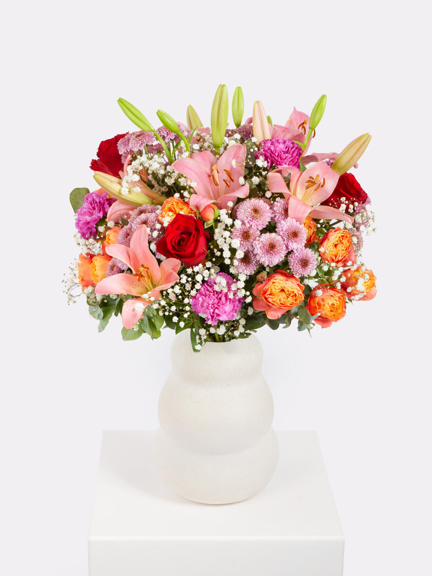 Charisma - Hauptblüte: Lilien, Nelken, Rosen - Hauptfarbe: Orange, Pink, Rosa, Rot