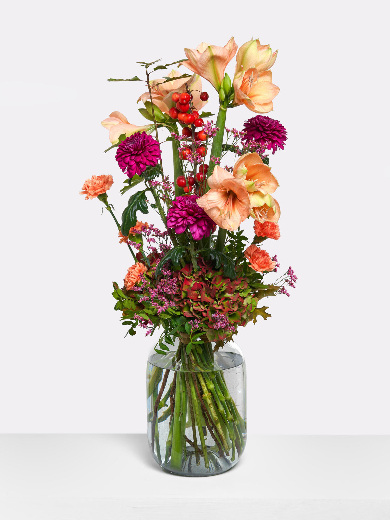 Festlicher Blumengruß - Hauptblüte: Amaryllis, Chrysanthemen, Hortensien, Nelken - Hauptfarbe: Apricot, Violett