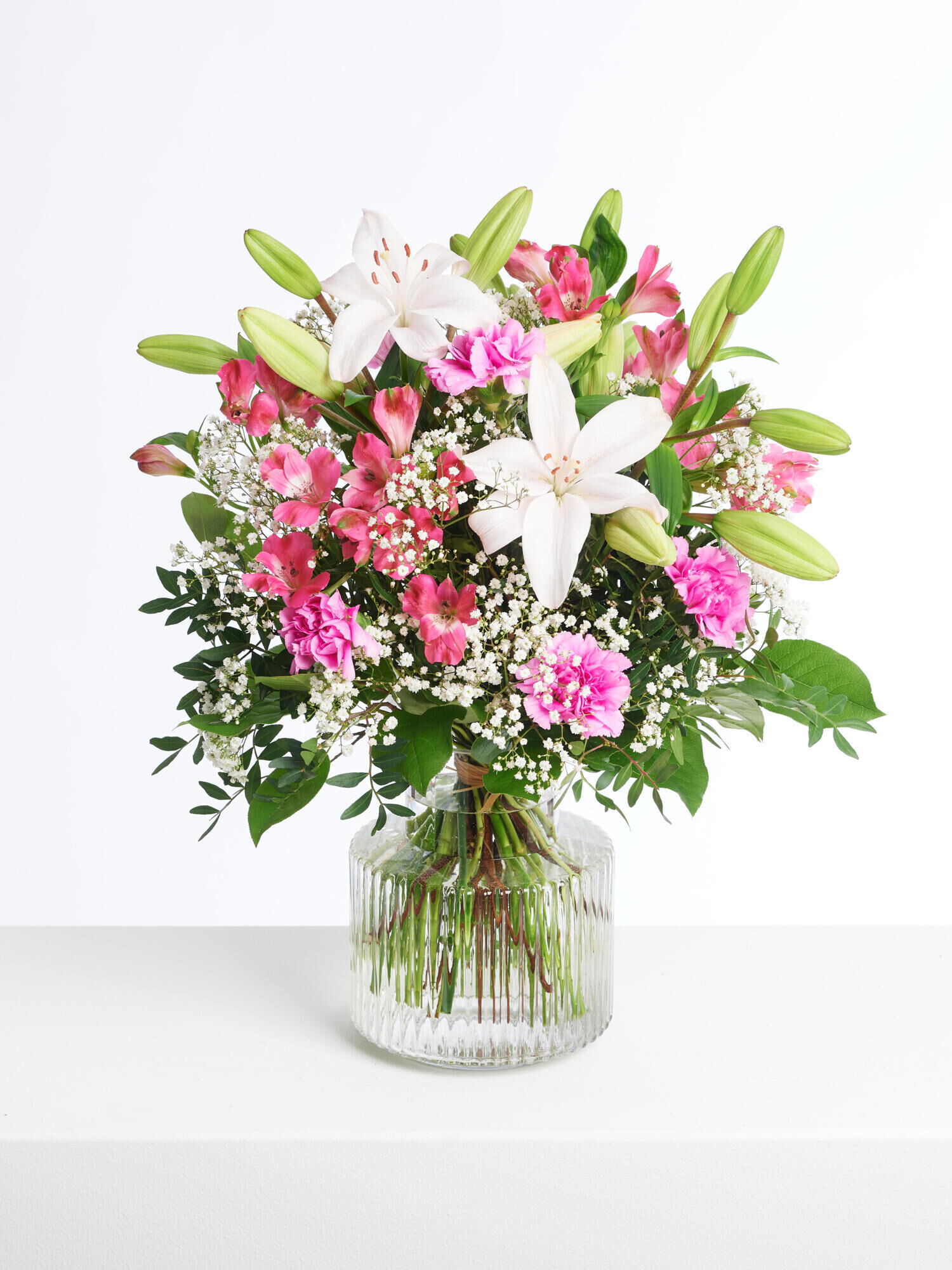 Fröhlich und aufgeweckt - Hauptblüte: Alstromerien, Lilien, Nelken - Hauptfarbe: Pink, Rosa, Weiß