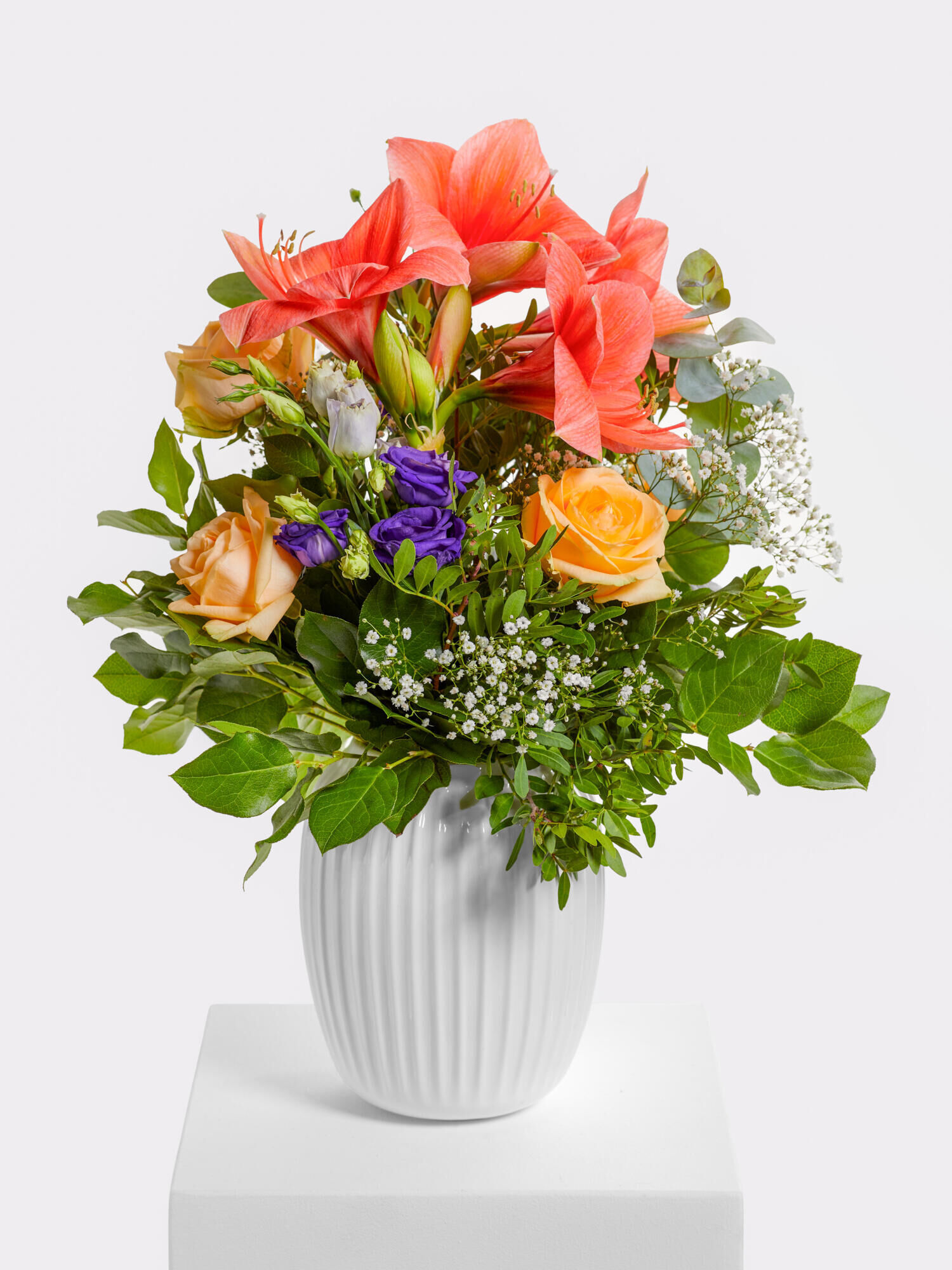 Besinnlichkeit - Hauptblüte: Amaryllis, Eustoma, Rosen - Hauptfarbe: Apricot, Violett