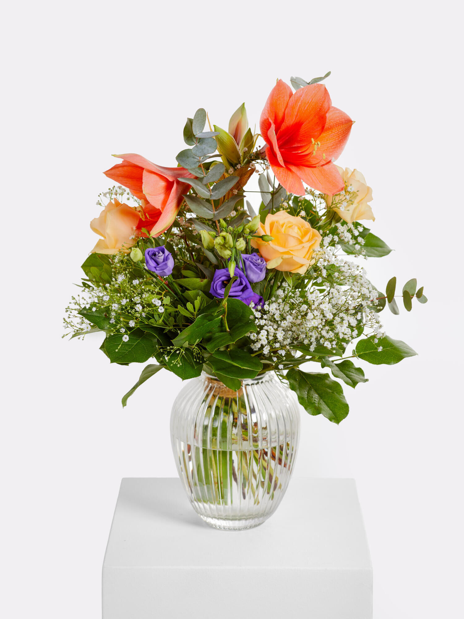 Besinnlichkeit - Hauptblüte: Amaryllis, Eustoma, Rosen - Hauptfarbe: Apricot, Violett