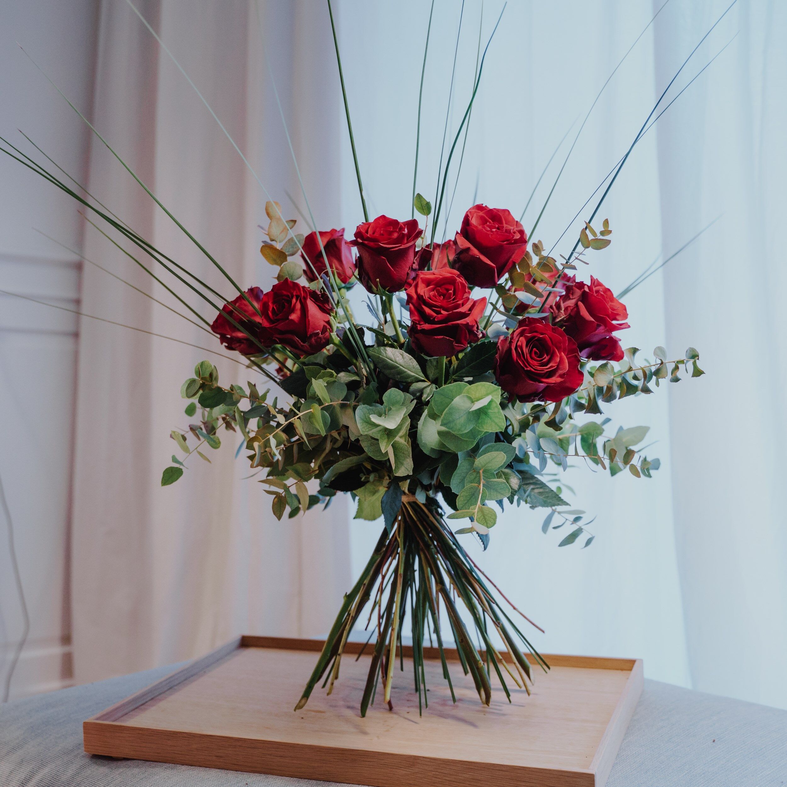 12 Red Roses with greenery