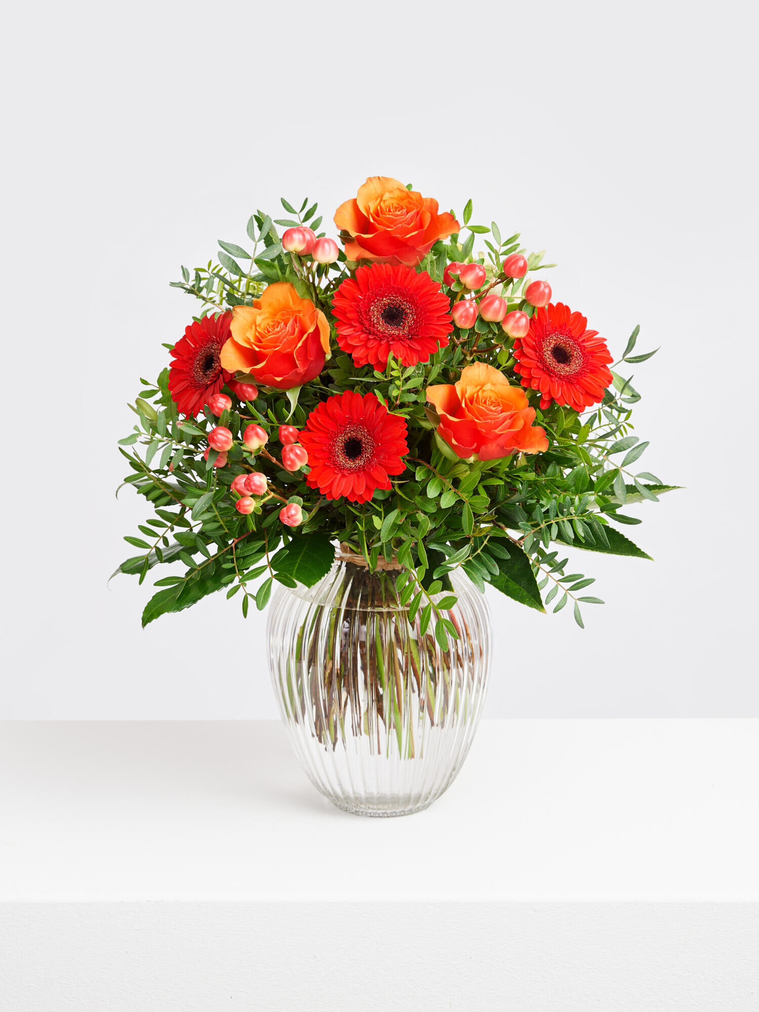 Strauß der Woche - Hauptblüte: Germini, Rosen - Hauptfarbe: Orange, Rot