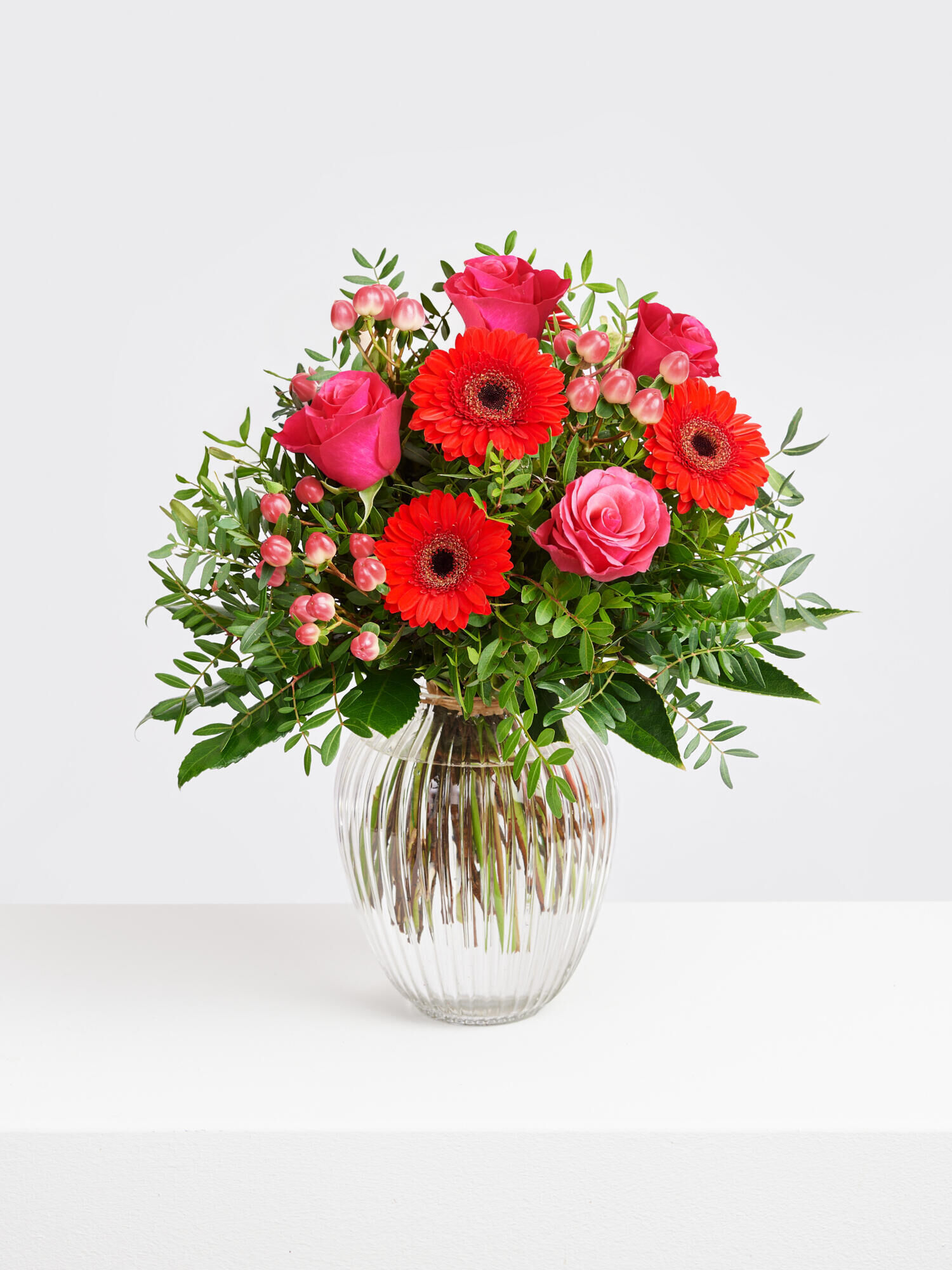 Strauß der Woche - Hauptblüte: Germini, Rosen - Hauptfarbe: Pink, Rot