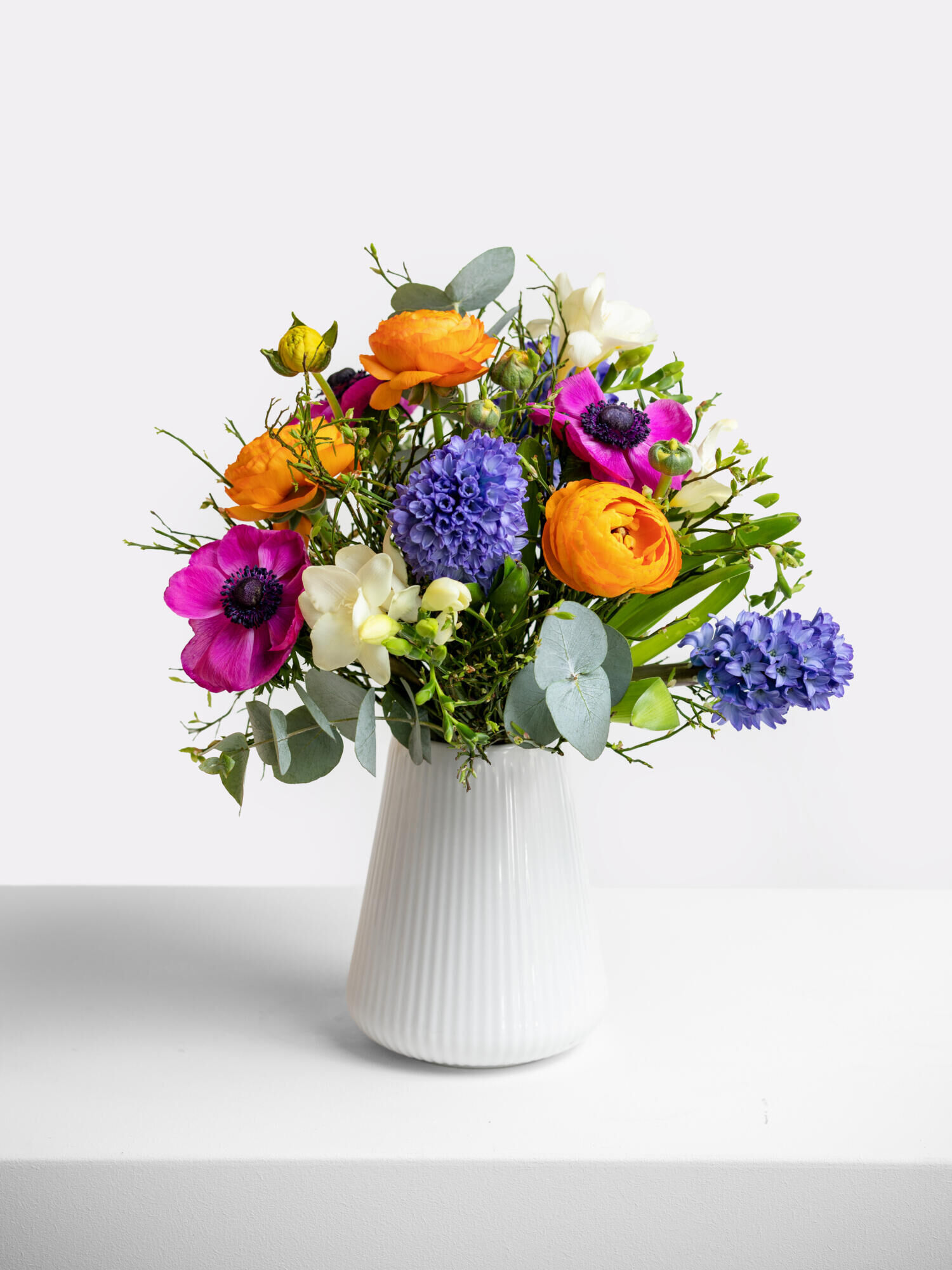 Spring Awakening - Main Colors: VARICOLORED - Main Flowers: FREESIA, HYACINTHS, RANUNCULI