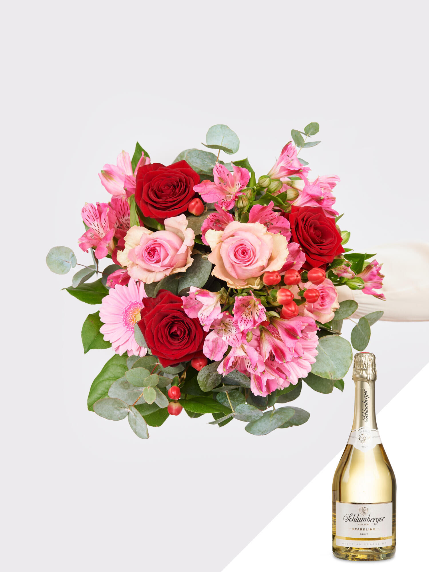 Herzliches Kompliment mit Schlumberger Sekt - Hauptblüte: Alstromerien, Germini, Rosen - Hauptfarbe: Pink, Rosa, Rot