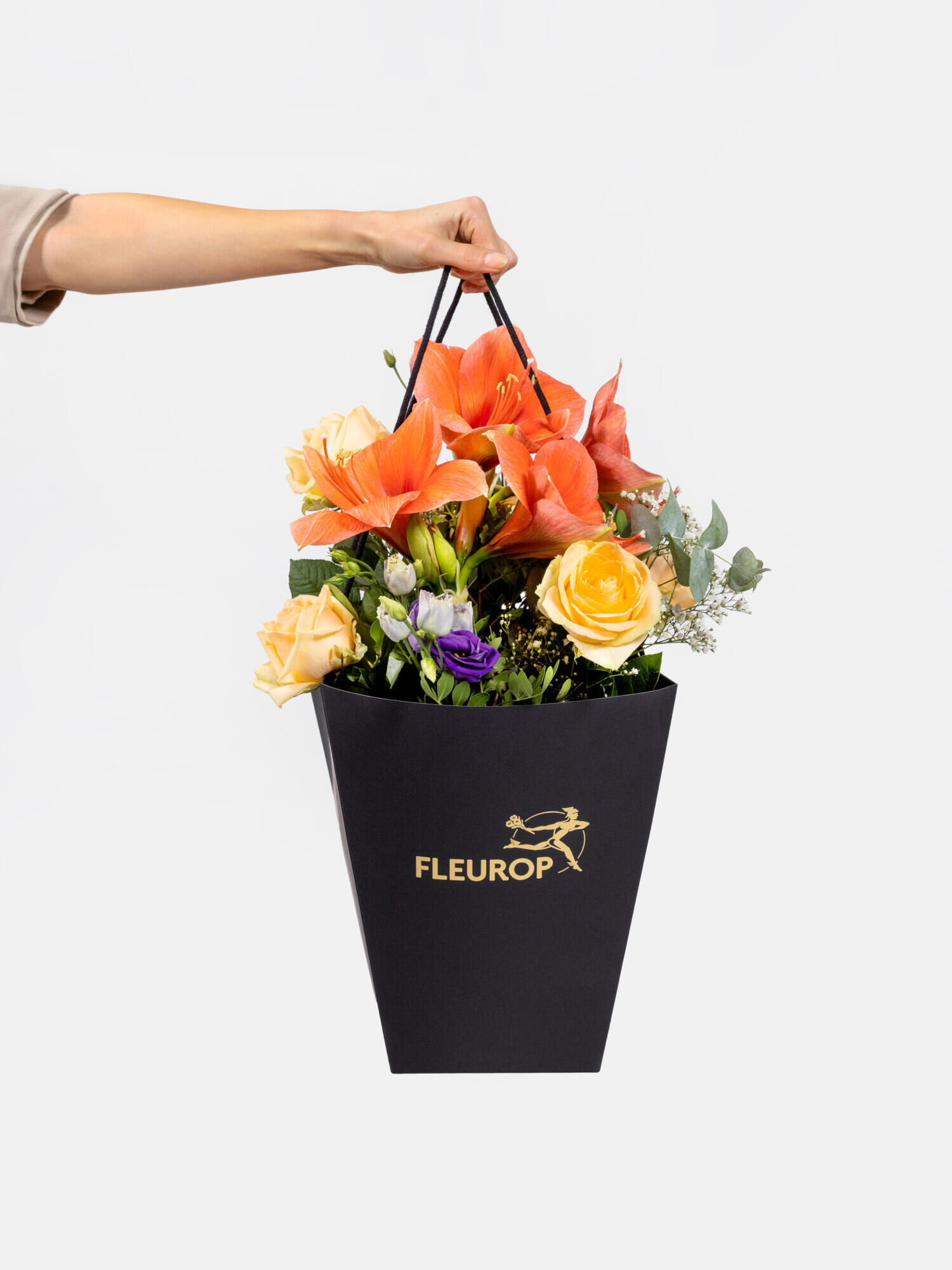 Besinnlichkeit - Hauptblüte: Amaryllis, Eustoma, Rosen - Hauptfarbe: Apricot, Violett
